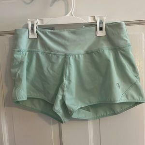 Women’s blue-green colored shorts